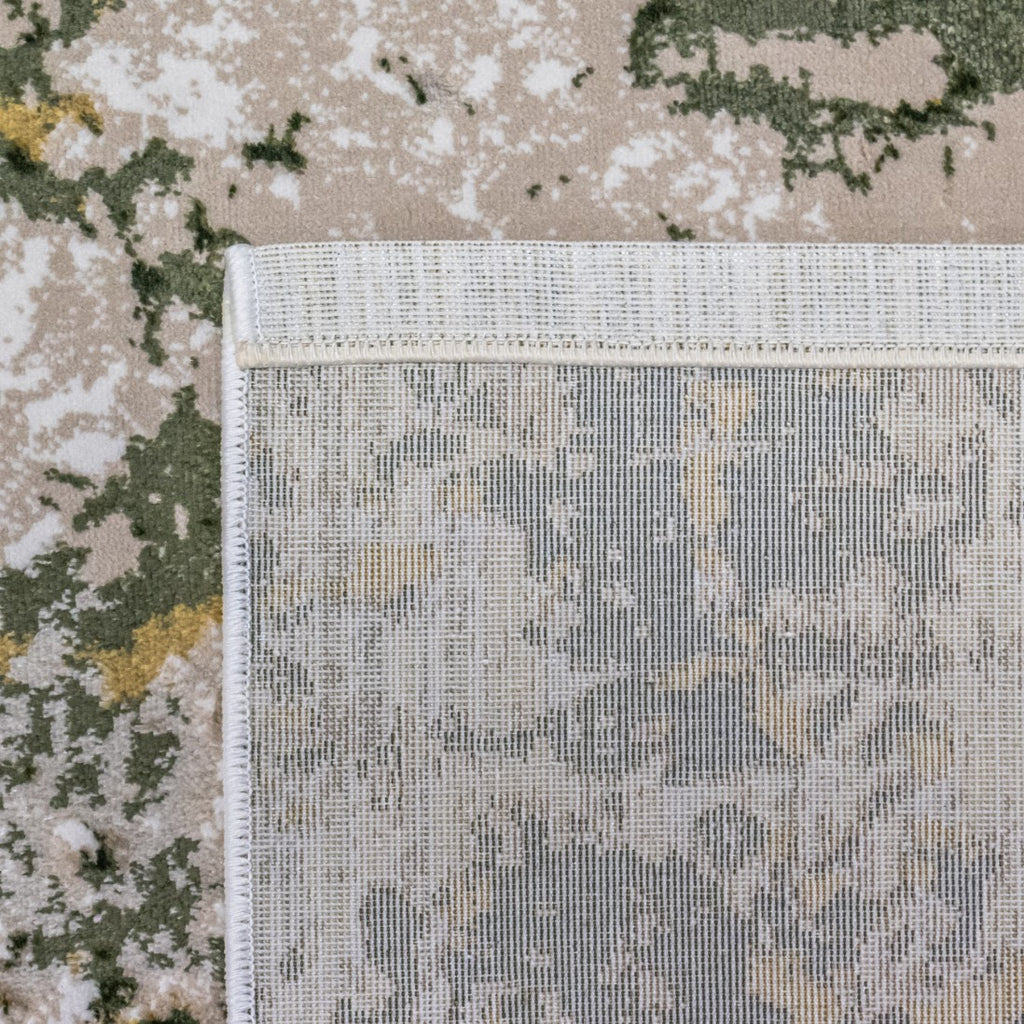 Paradise Living – Tapete Batik 38/005 Verde, detalhe do canto com verso antiderrapante texturado e costura de rebordo dupla, padrão verde e dourado visível