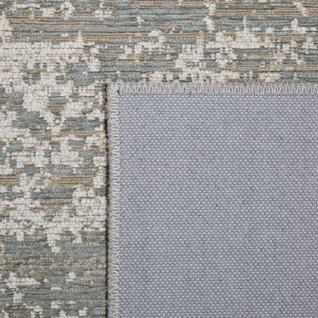 Paradise Living – Tapete Abstrato Adore 4002/350 Cinzento, detalhe do verso em juta com acabamento costurado