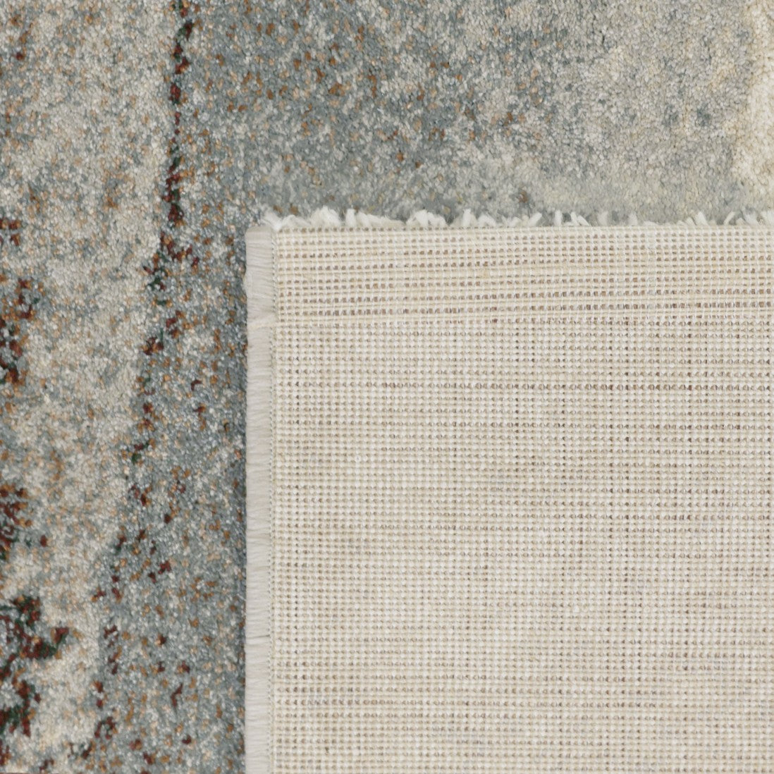 Paradise Living — Pormenor do design abstrato do tapete Corfu 57718 em castanho e azul