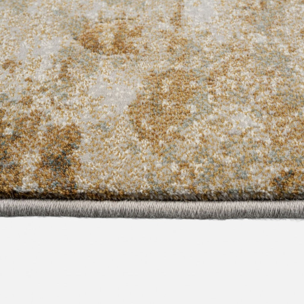 Paradise Living – Tapete Giacomo 63872/7299 detalhe da orla lateral com textura densa em tons bege, dourado e castanho