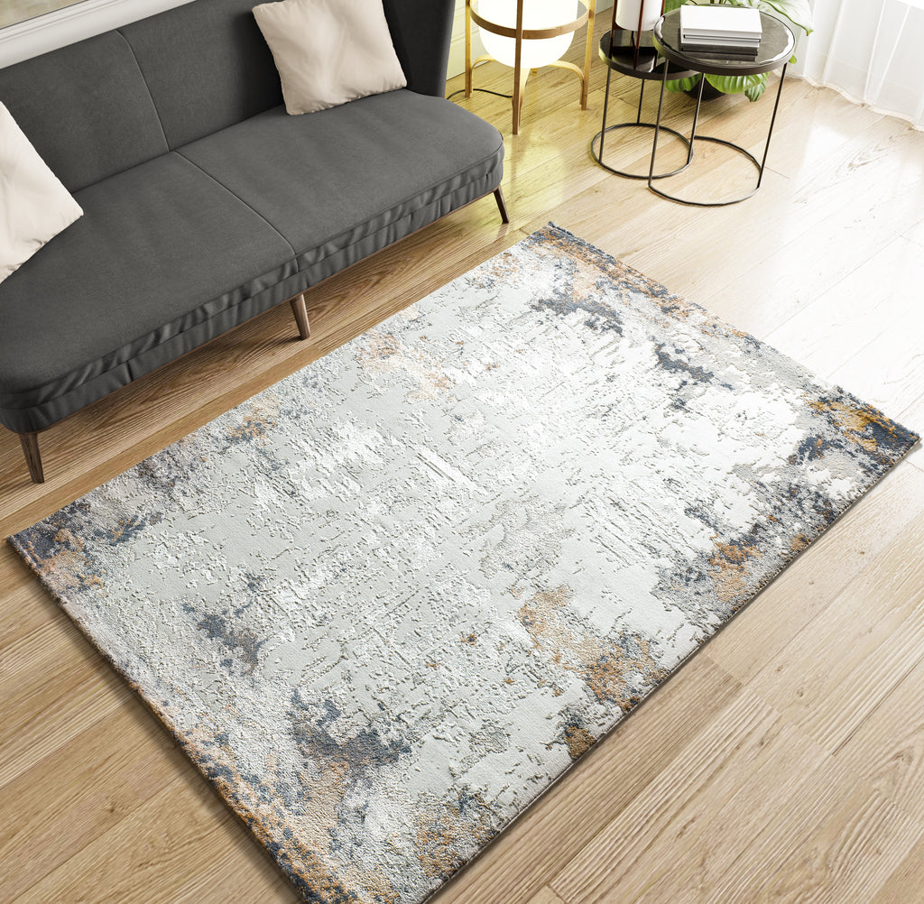 Tapete Keops 6418-21 Multi em contexto de sala de estar com design abstrato desgastado em tons creme, azul e terracota – Paradise Living