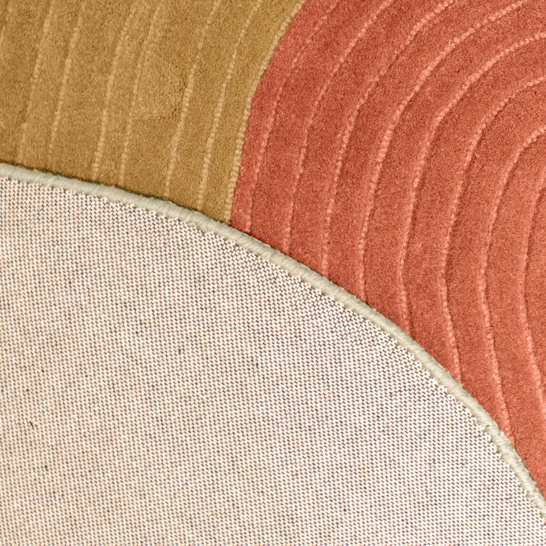 Paradise Living Tapete Pebble – Detalhe da textura e acabamento do verso do tapete em lã