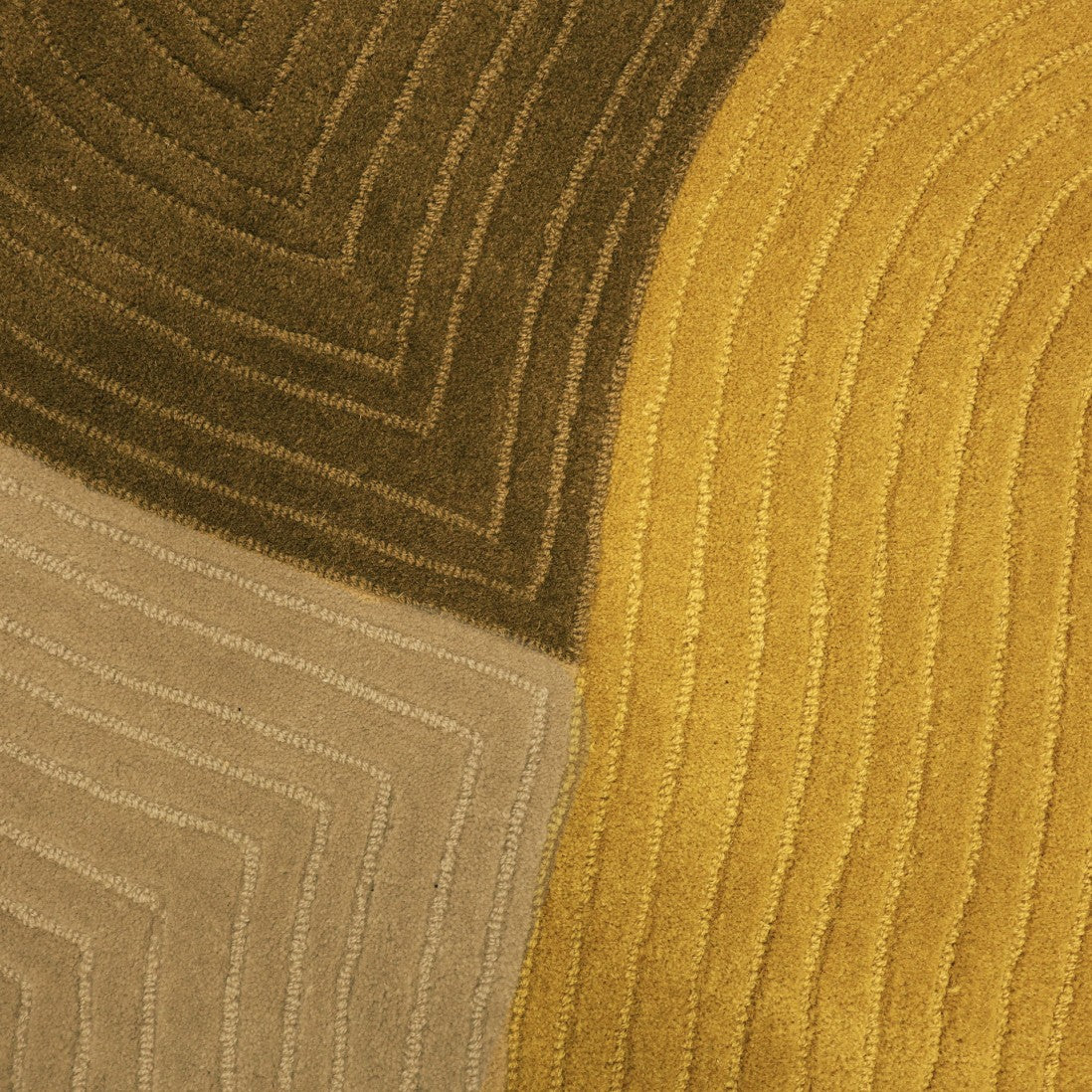 Paradise Living Tapete Pebble Verde – Detalhe da textura e acabamento do verso do tapete em lã verde