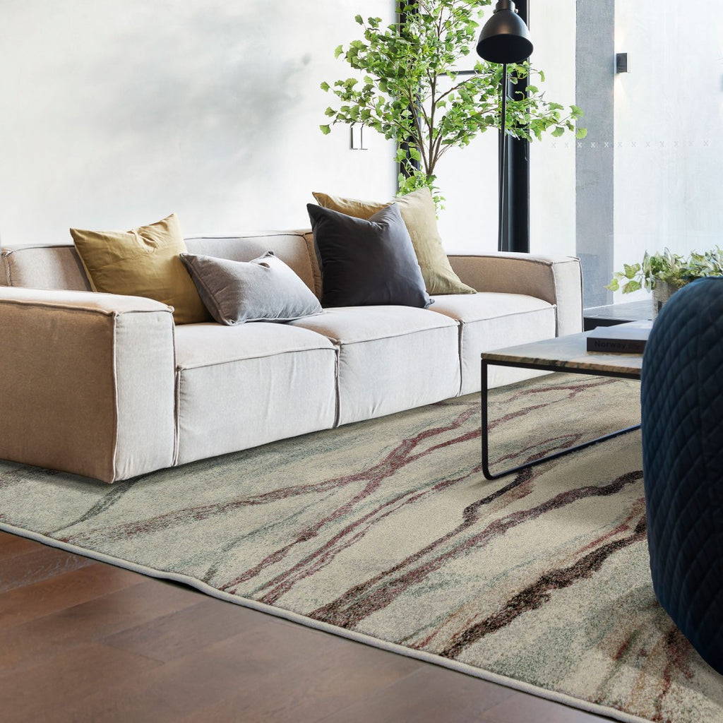 Paradise Living – Tapete Magritt 34068/6262 em sala moderna com sofá bege e almofadas em tons terra