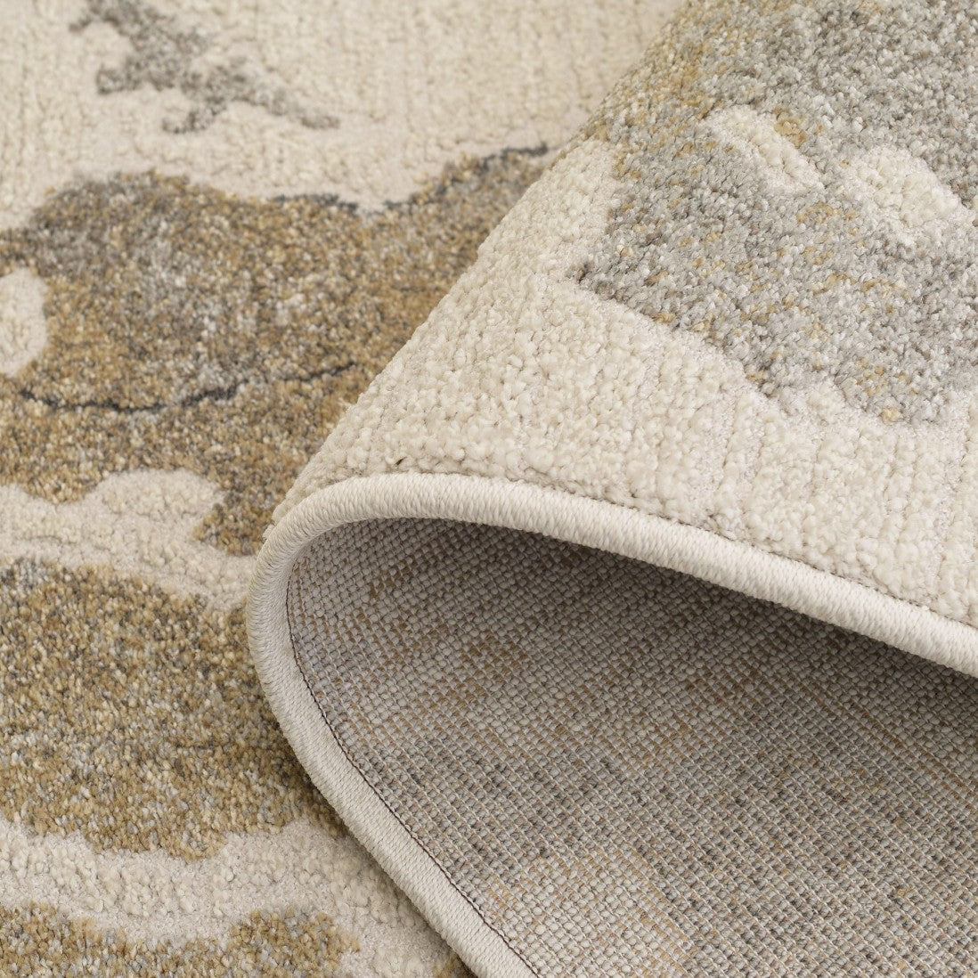 Paradise Living – Tapete Magritt 46013/6191 detalhe da frente e verso com canto dobrado em creme e bege