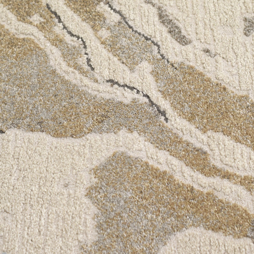Paradise Living – Tapete Magritt 46013/6191 close-up da textura com padrão marmoreado em tons bege e cinzento