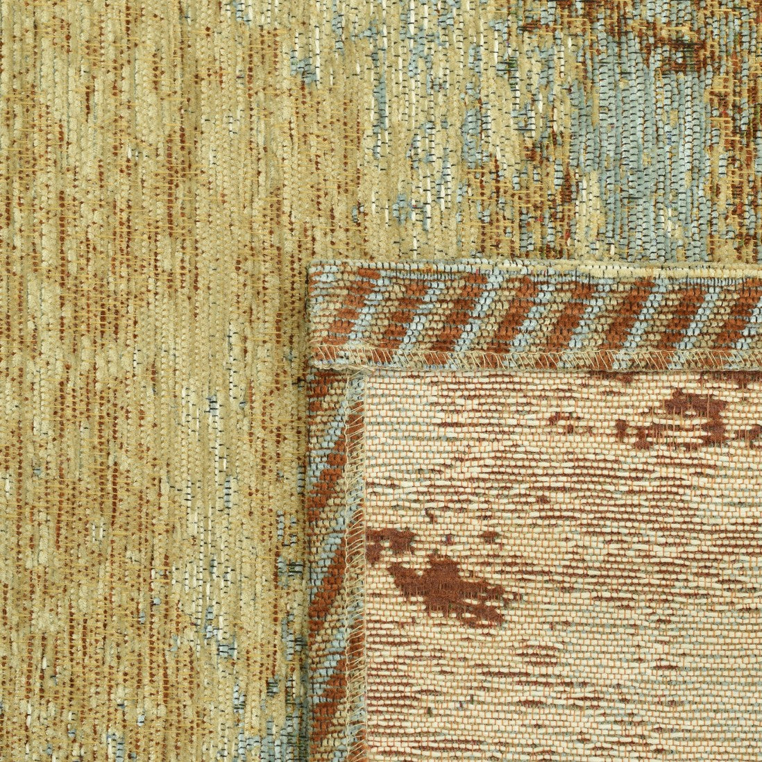 Paradise Living – Tapete Ametist Chenille 287 Multicolor close-up da textura chenille com padrão abstrato em tons azul acinzentado, terracota e bege
