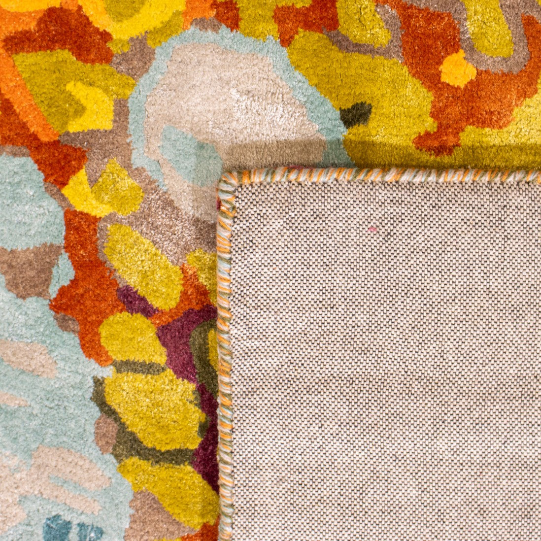 Paradise Living Tapete Chameleon design abstrato multicolor — padrão orgânico vibrante, detalhe verso